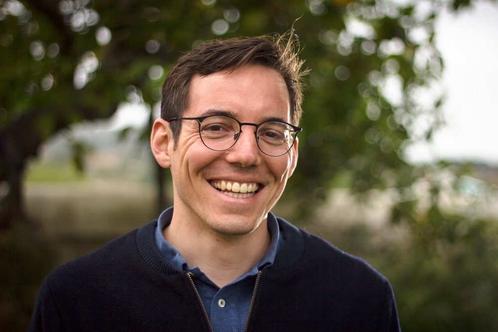 Christoph, the maker of LifeSparks, smiling outdoors